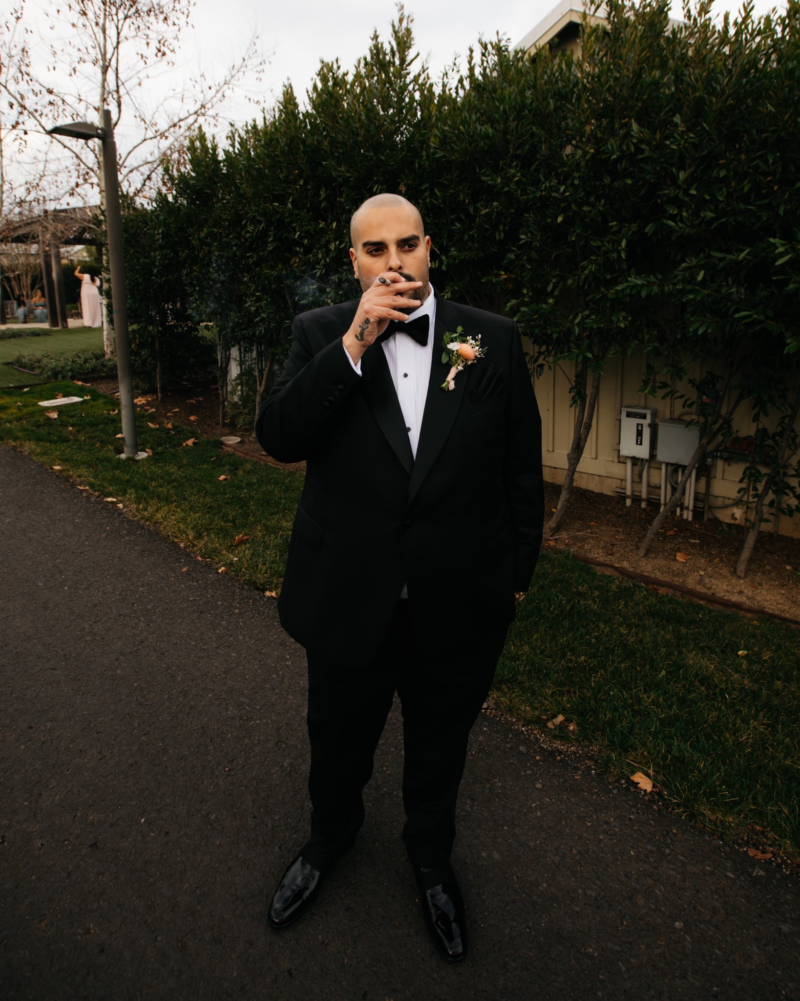FJNXD1JVEAIyZvG Berner the CEO of Cookies in black suit during his marriage ceremony.